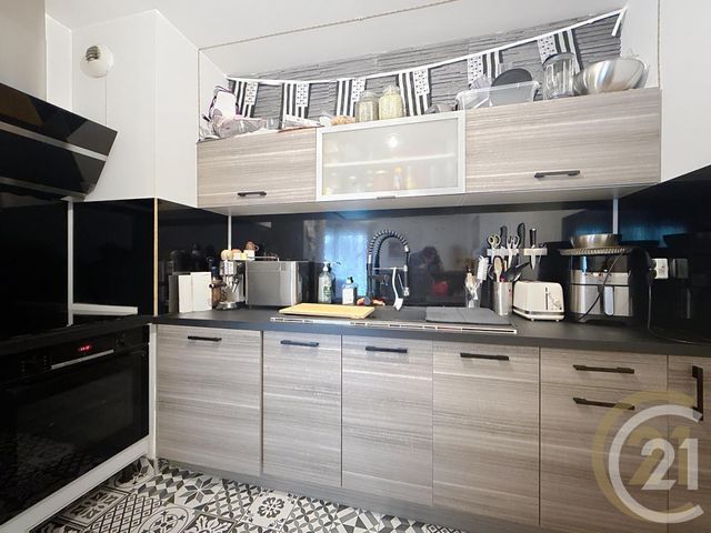 Appartement F3 à vendre - 3 pièces - 57.26 m2 - LE PETIT QUEVILLY - 76 - HAUTE-NORMANDIE - Century 21 Bruno Ferrand