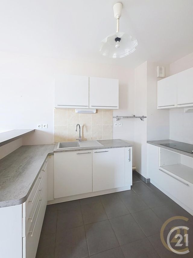 Appartement F4 à louer - 4 pièces - 73.23 m2 - DEVILLE LES ROUEN - 76 - HAUTE-NORMANDIE - Century 21 Bruno Ferrand